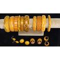 Butterscotch bakelite nine carved bangles and four pairs of earrings