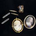 Victorian jewelry shell cameo pendant mounted in bloomed 14k yg cameo ring in 14k yg size 7 14k yg thimble painted porcelain brooch of a small child mounted in 10k yg and four handy pins in 14k an