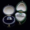 Platinum sapphire and diamond ring together with a 14k wg emerald and diamond ring diamonds approx 48 ct tw 108 gs sizes 76