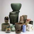 Art pottery group lot approx sixteen pieces include gouda limoges hull niloak red wing weller attr and others spurious grueby mark to one tallest 21