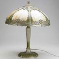 Royal art glass co slag glass and enameled metal lamp ca 1920 23 x 18 dia