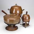 Karl raichle meersburg bauhaus hammered copper two chafing dishes and similar bulbous pot each with stand and spirit burner all have impressed marks tallest 14
