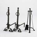 Arts  crafts andirons in patinated wrought iron together with similar set of fireplace tools andirons 30 x 11 x 22