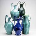 North carolina pottery five pieces include two ewers and three urns tallest 18