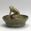 Walrath bowl with seated figure stilt pull to one foot marked 6 12 x 7 dia