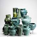 Art pottery grouping sixteen pieces include fulper musical bottle and shenandoah pottery tallest 9 12