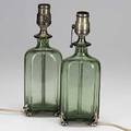 Roycroft pair of glass lamps each with green glass flask and silver washed mounts provenance roycroft inn east aurora ny orb  cross mark 11 12 x 4 14 x 3