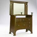 Liberty  co dresser with rotating mirror heart cutouts and handles and five asymmetrical drawers pulls marked l  c 63 14 x 44 x 19