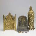 Religious items six pieces include brass statue of the virgin mary shadow box reliquary pendant reliquary silvermounted faience pendant brass pillbox and contemporary brass triptych icon talles