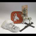 Five modern sculptures sir cecil plaster mask illegibly signed plaster over wire horseback rider wroughtiron crucifix iron horseback rider mounted on a brick enamel on copper signed made in ger