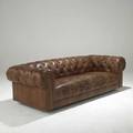 Chesterfieldstyle sofa entirely covered in tufted brown vinyl 20th c 26 x 86 x 34