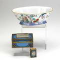 Chinese import ware cloisonne enameled brass cigarette box and match safe with white jade carved insets and footed ogeeform pottery bowl with enameled birds butterfly and flowers early 20th c lar