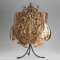 English arts  crafts hammered copper firescreen mounted on a wroughtiron stand 29 x 21 12 14