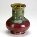 Fulper bulbous vase with banded neck covered in frothy mosstorose flambe glaze small glaze nick to widest part of base vertical mark 9 34 x 8 14
