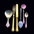 French and scandinavian flatware eighteen piece partial gilt metal fruit service by christofle together with a set of twelve enameled silver gilt spreaders and other similar scandinavian pieces by va