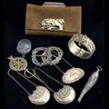 Silver and plate accessories chinese silver mounted tobacco purse three silver bottle tags and six pieces of jewelry