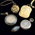 Five pieces antique jewelry and pocketwatches art nouveau ivory and gold entwined swan necklace spherical ivory netsuke depicts a cluster of animals bohemian garnet and agate navette brooch elgin