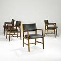 Edward wormley dunbar four sculpted walnut dining chairs with leather upholstery one with brass d tag 31 12 x 22 34 x 22