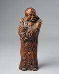 A Chinese Carved Wood Figure of a Sage with a Cat