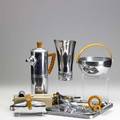 Chase chrome barware twentyfour pieces include pitcher with bakelite handle ice bucket heartshaped tray tray with natural wood bottom etc
