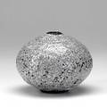 Otto heino squat vessel with small opening covered in a thick white crackled volcanic glaze marked 5