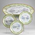 Limoges porcelain fish platter gravy boat and eleven plates handpainted with various scenes early 20th c marked platter 23 x 10