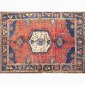 Persian vis rug central medallion on red ground with blue banded border 20th c 62 x 78
