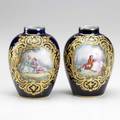 Sevres pair of vases with gilded decoration surrounding a classical scene on a cobalt ground 19th20th c artist initials jv 4 12