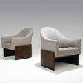 Milo baughman thayer coggin pair of barrel lounge chairs on bookmatched rosewood bases unmarked 31 12 x 27 x 31