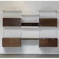 George nelson herman miller walnut comprehensive storage systems css with four vertical supports five cabinets one desktop and three enameled metal shelves herman miller metal tag 66 x 96 x
