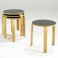 Style of alvar aalto nesting tables in laminate and birch plywood branded made in danmark 16 12 x 15 34 dia