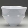 Anne marie backermohr thrown porcelain bowl with sculptural details covered in pale celadon glaze signed with artists cipher 6 12 x 9 dia