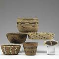 Six american indian baskets from california and the northwest twined and coiled including pomo and hupa largest 7 x 6