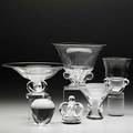 Steuben six pieces in clear crystal 20th c crown and apple paperweights footed compote with crown base large tulip vase trumpet vase and an urn each engraved steuben tallest 6 34