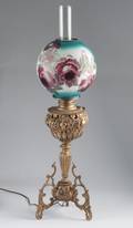 A Victorian Brass Table Lamp with Painted Globe