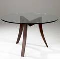 Dialogica cooke dining table with circular plate glass top over sculptural solid maple base in mahogany finish stamped dialogica 28 34 x 48 dia
