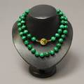A Malachite Bead and Cloisonne Clasp Necklace