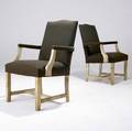 Decorative pair of parchmentcovered oak armchairs with original dark green fabric upholstery 37 12 x 22 12 x 21