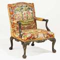 Chippendale style open armchair with carved frame and needlepoint upholstery 20th c 41 x 30 x 31