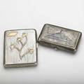 Two russian 84 silver cigarette cases ribbed with applied gold foliage and tag by v gordon st petersburg ca 1900 niello scenic by unrecognized maker ae moscow 1896 945 ot largest 3 14 x