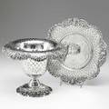 Gorham edwardian silver wine cooler and salver both chased throughout in tufted trompe loeil with pierced applied scrolling rococo borders ca 19011910 footed wine cooler with everted rim 8 12
