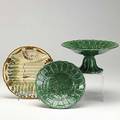 Three french majolica pieces two green leaf decorated compotes and an asparagus plate 19th c largest 10 x 5