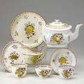 Soft paste porcelain tea set twentythree pieces include teapot cups saucers and bowls 19th c largest 9 34 x 5 12 x 5 12
