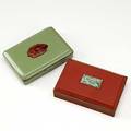 Two yamanaka enamel boxes jade and carnelian inserts on lids 20th c marked made in japan larger 1 14 x 5 12 x 3 12