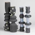 Stephanie samuels four totems pair of black and gold decorated with stars signed and dated 1989 together with a pair of blue and black unmarked one repaired tallest 20 x 5