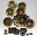 Asian lacquer sixteen pieces include oval tray six round plates four boxes four small open dishes and a paint box 19th20th c largest 12 12 x 8 12