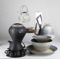 Contemporary craft pottery peter saenger black porcelain tea set and louis vaccaro cylindrical vase together with seven pieces by stephen fabrico including a black vase covered jar two bowls two su
