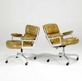 Charles  ray eames for herman miller pair of rolling timelife armchairs each with herman miller label 33 x 29 x 27