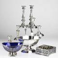 Silver  silver plate grouping two pairs of weighted sterling candlesticks openwork footed centerpiece with cobalt liner footed silver plate basket celtic motif silver plate flower frog and pair si