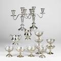 American silver pair of two arm weighted candelabra nine sterling coupes seven with glass inserts and weighted sterling creamer and sugar